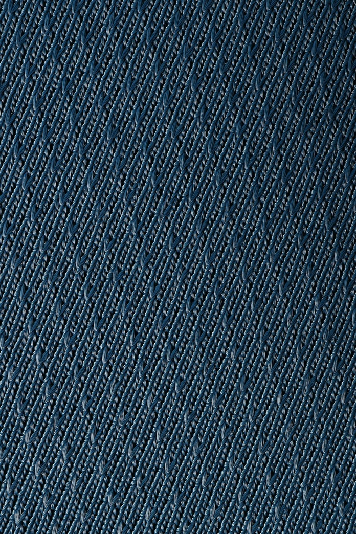 Cloth gaming mouse pad with woven surface and natural foam rubber base, produced by a professional gaming mouse pad manufacturer.